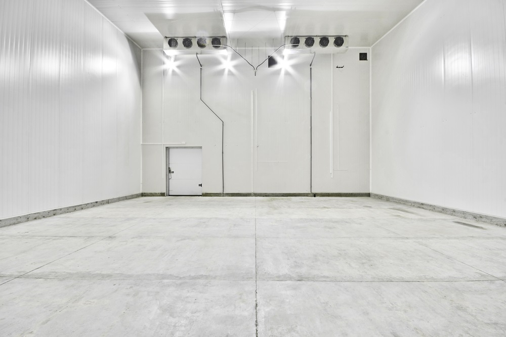 An Empty Industrial Room Refrigerator With Eight Fans